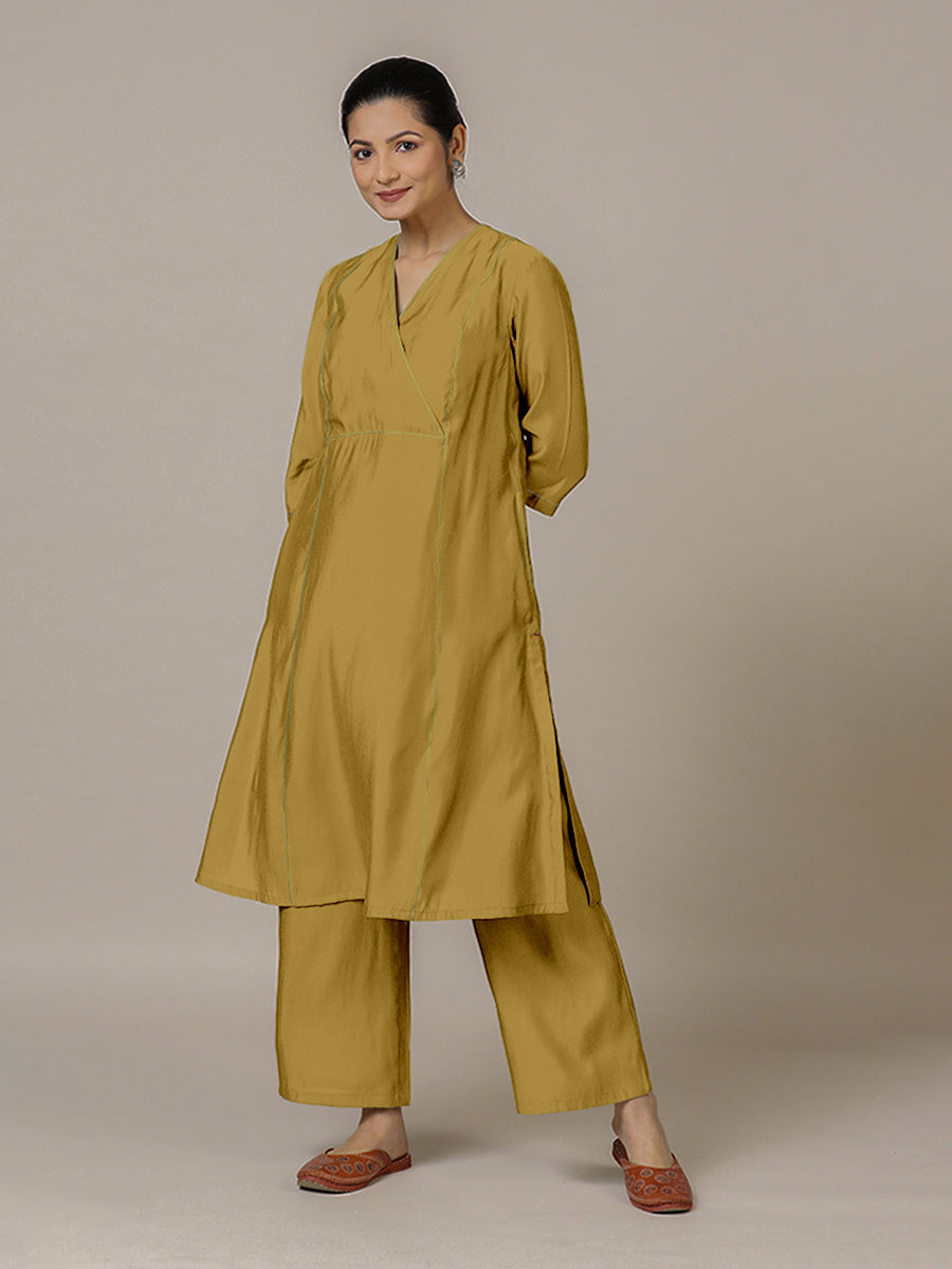 Amal x Rozaana Kurta, in Yellow Viscose, featuring three quarter sleeves and overlap v-neckline, made for daily & work.