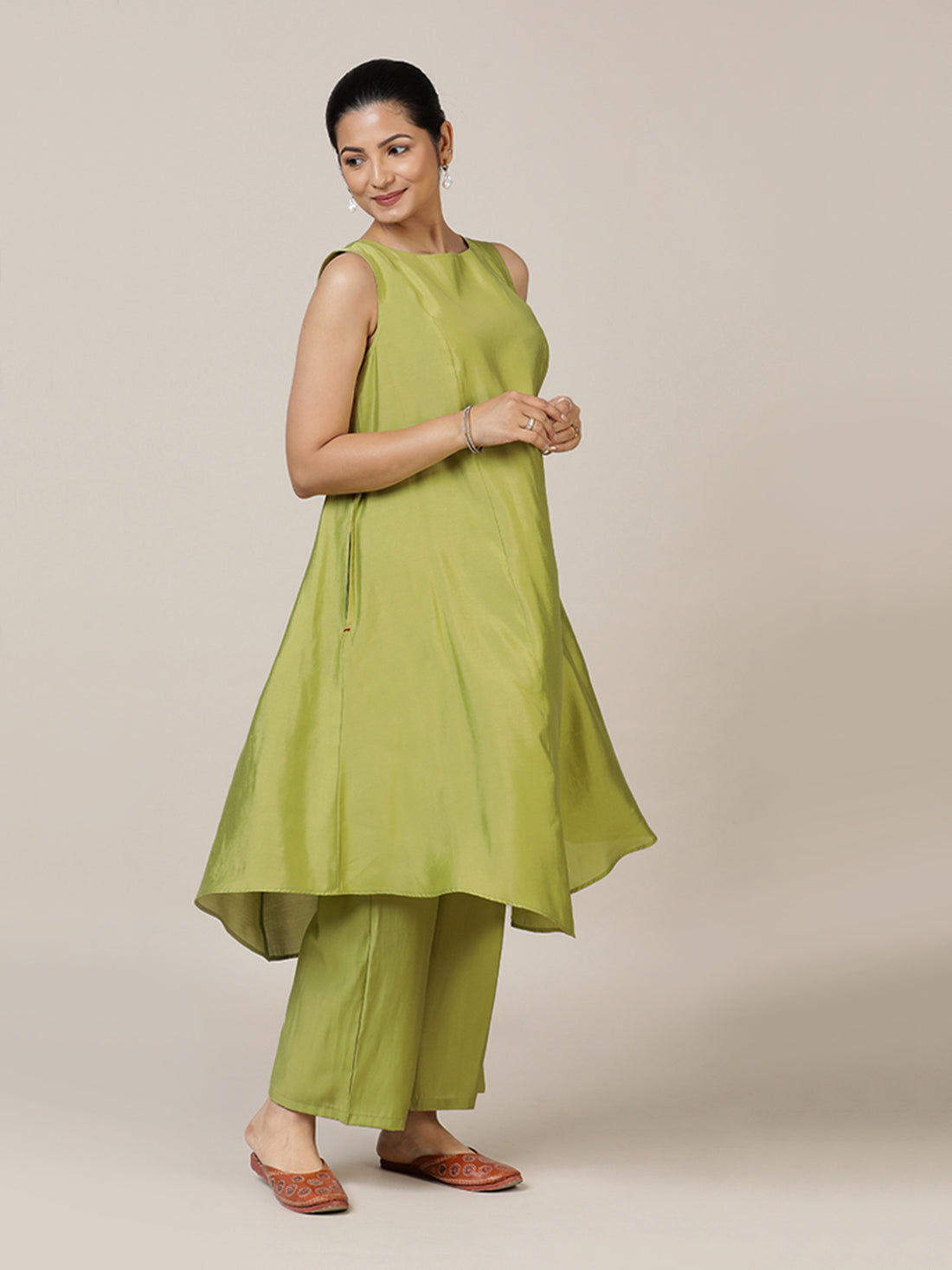 Anoki x Rozaana Kurta, in Green Viscose, featuring sleeveless and boat neckline, made for daily & work.