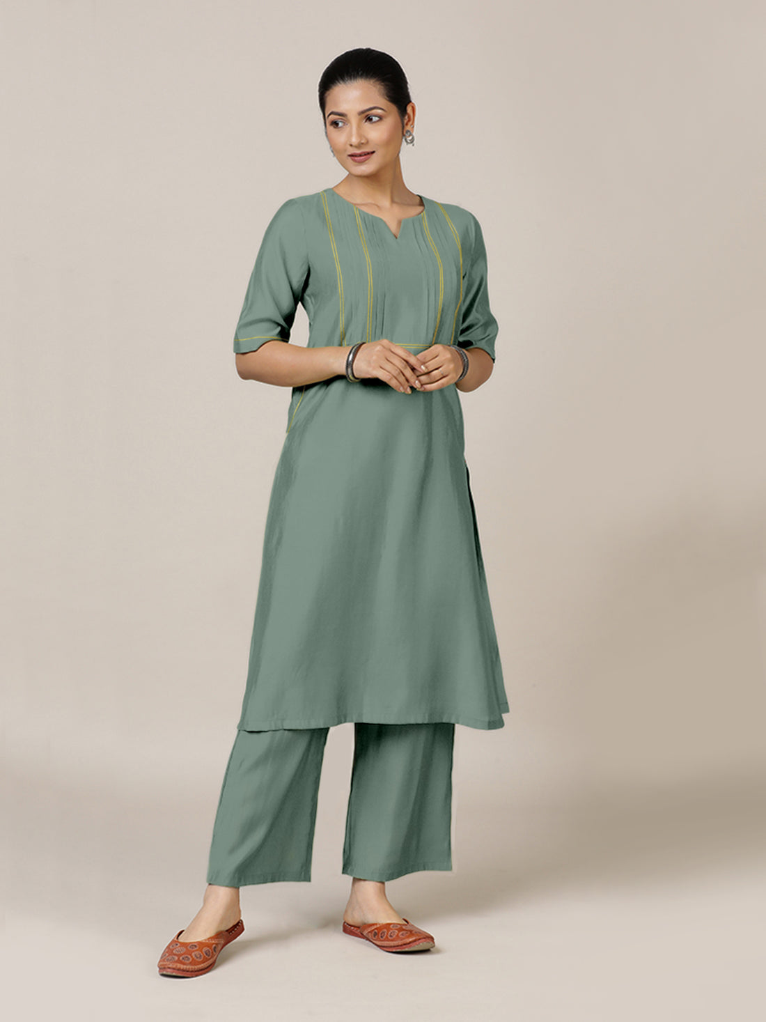 Esha x Rozaana Kurta, in Green Viscose, featuring elbow sleeves and round neck with splitline, made for daily & work.