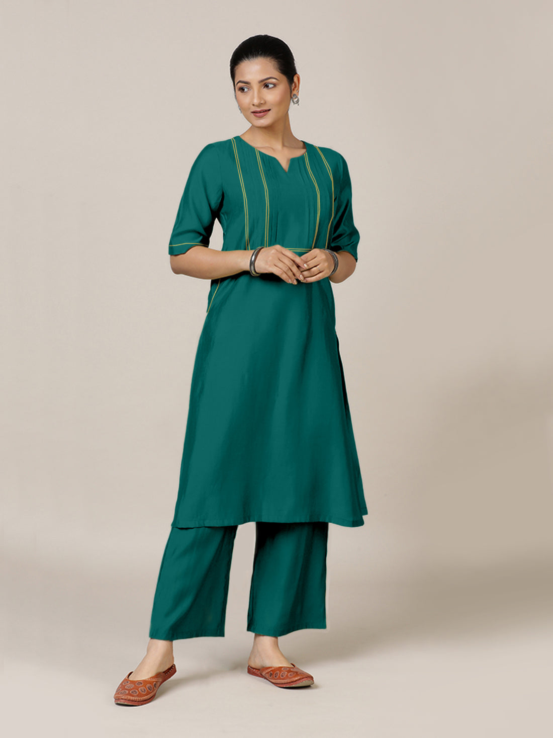 Esha x Rozaana Kurta, in Green Viscose, featuring elbow sleeves and round neck with splitline, made for daily & work.