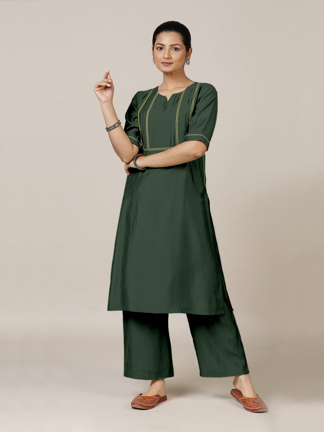 Esha x Rozaana Kurta, in Green Viscose, featuring elbow sleeves and round neck with splitline, made for daily & work.