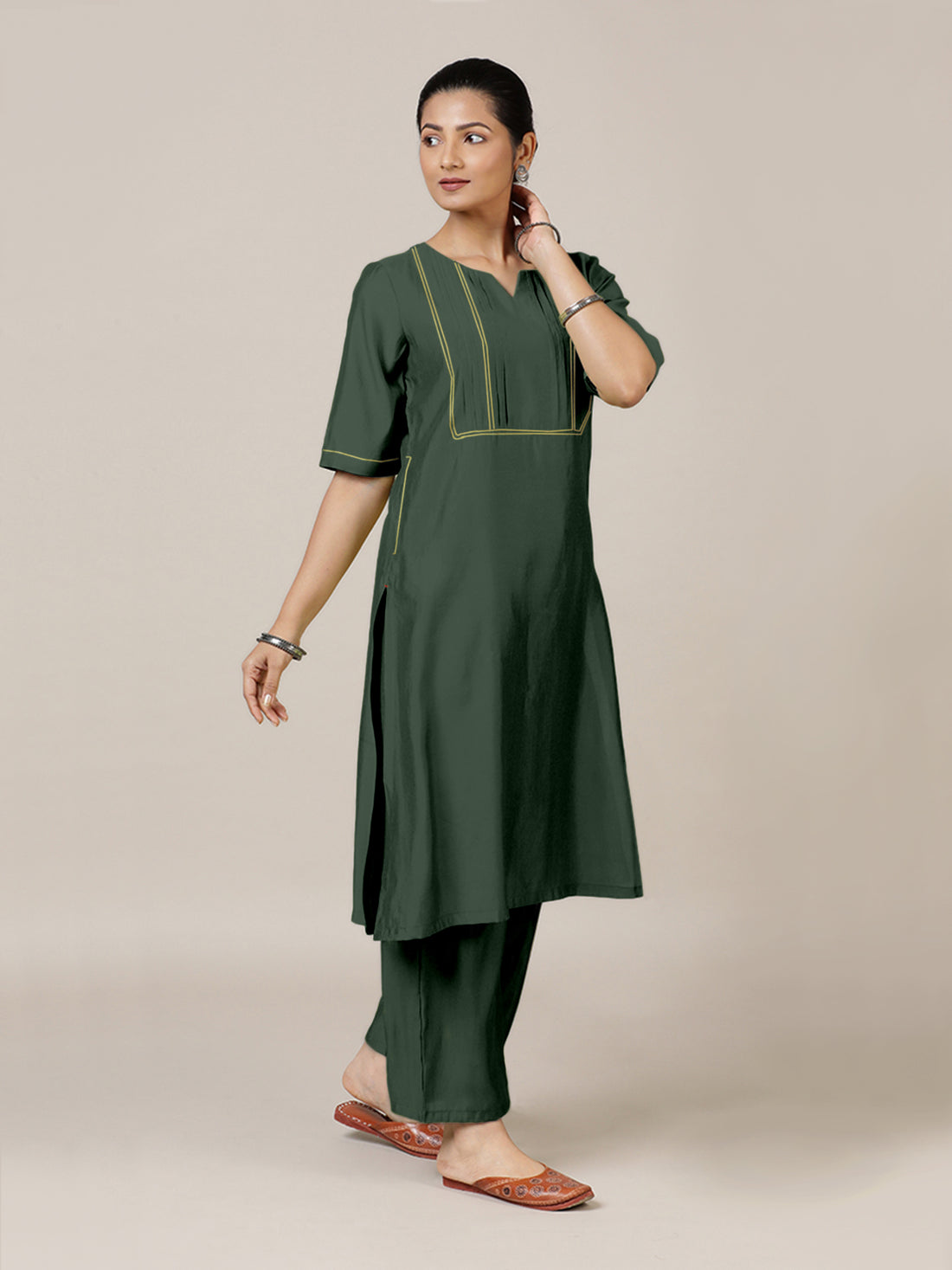 Esha x Rozaana Kurta, in Green Viscose, featuring elbow sleeves and round neck with splitline, made for daily & work (view 7).