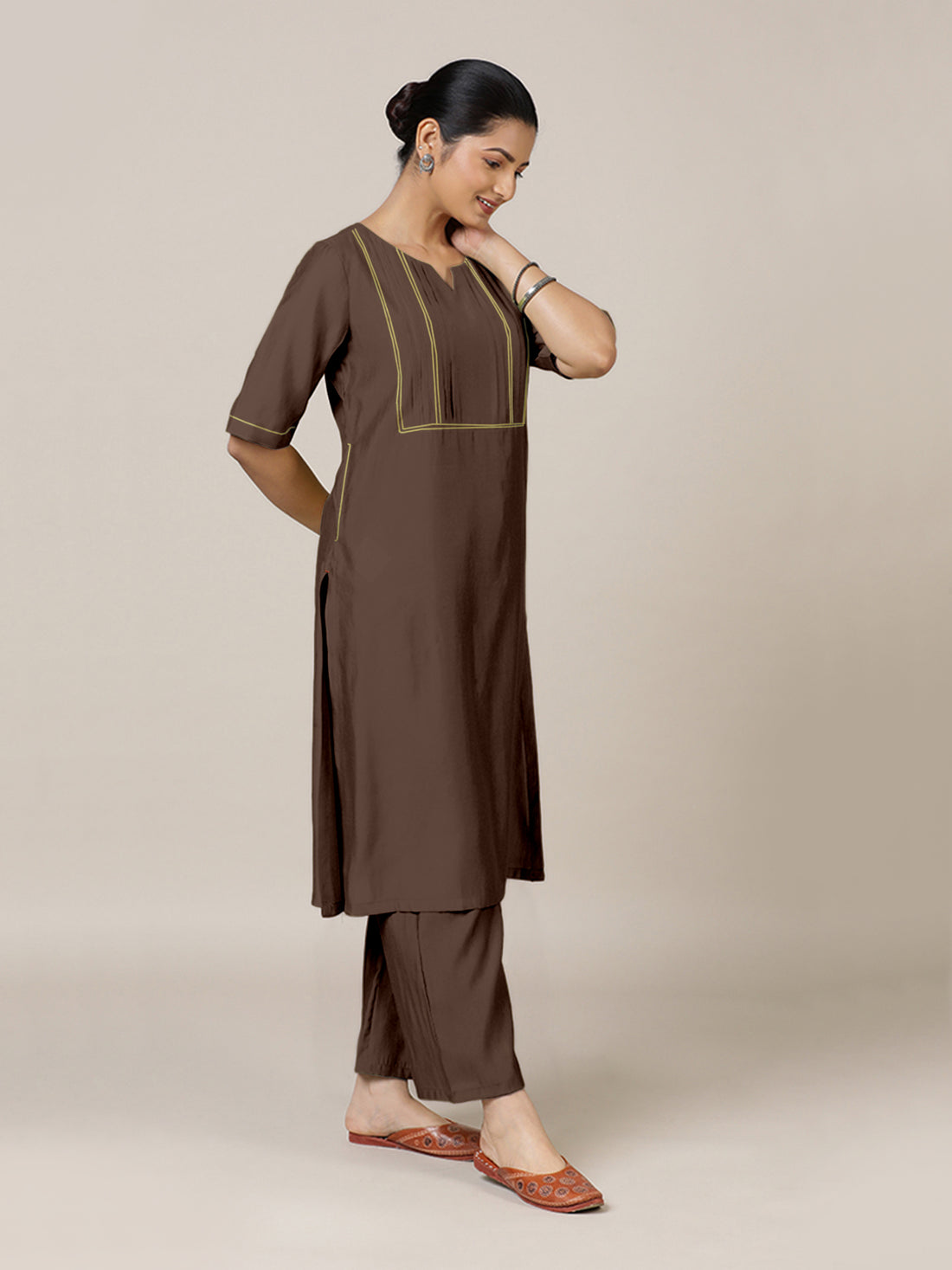 Esha x Rozaana Kurta, in Brown Viscose, featuring elbow sleeves and round neck with splitline, made for daily & work.