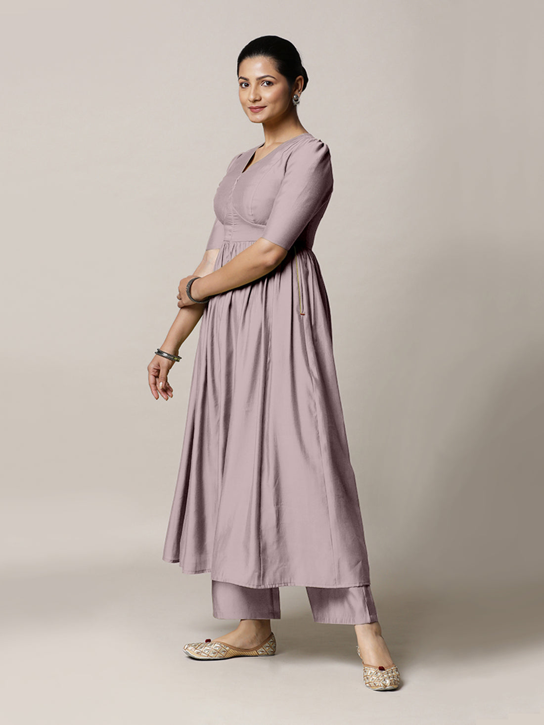 Faiza x Rozaana Kurta, in Purple Viscose, featuring elbow sleeves and v-neckline, made for daily & work.