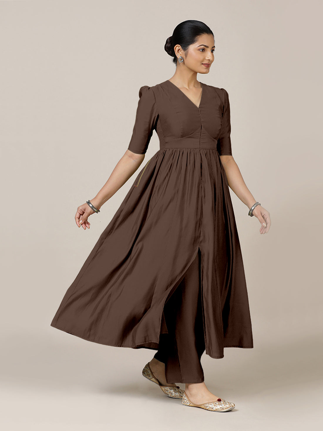 Faiza x Rozaana Kurta, in Brown Viscose, featuring elbow sleeves and v-neckline, made for daily & work.
