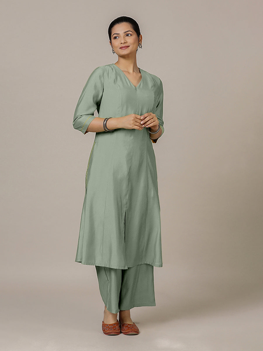 Mahek x Rozaana Kurta, in Green Viscose, featuring three quarter sleeves and v-neckline, made for daily & work.