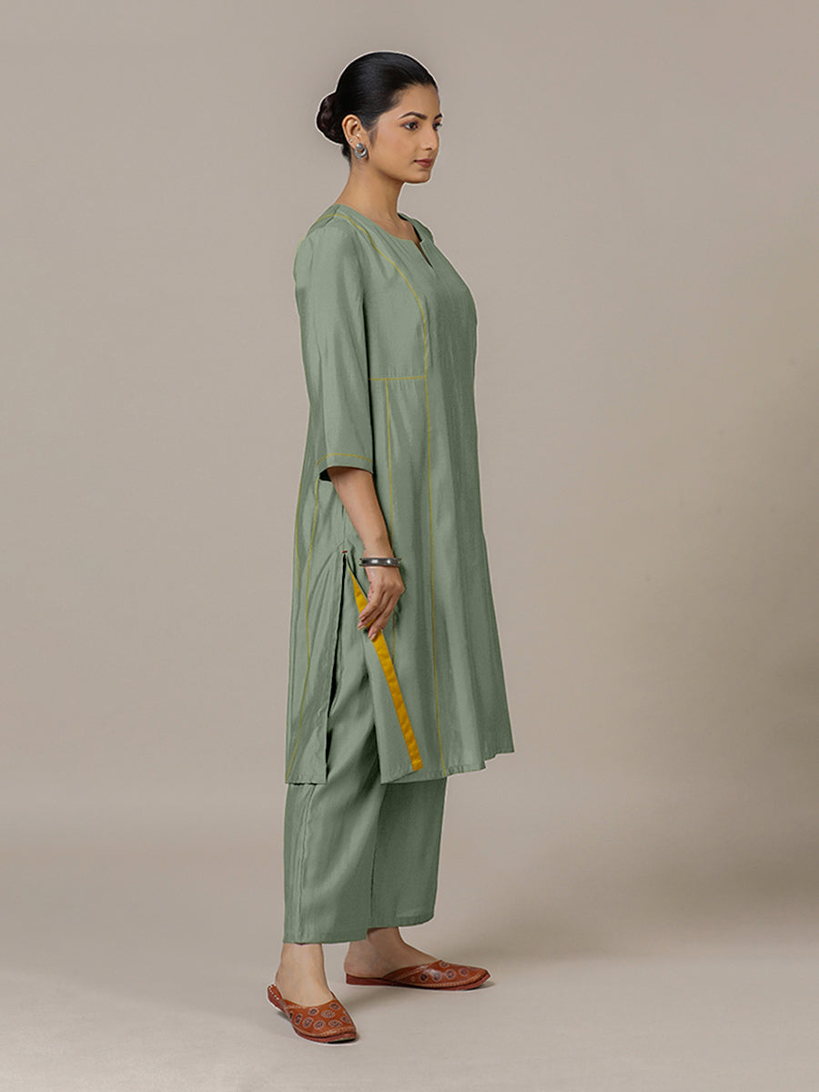 Mahi x Rozaana Kurta, in Green Viscose, featuring three quarter sleeves and round neck with splitline, made for daily & work.