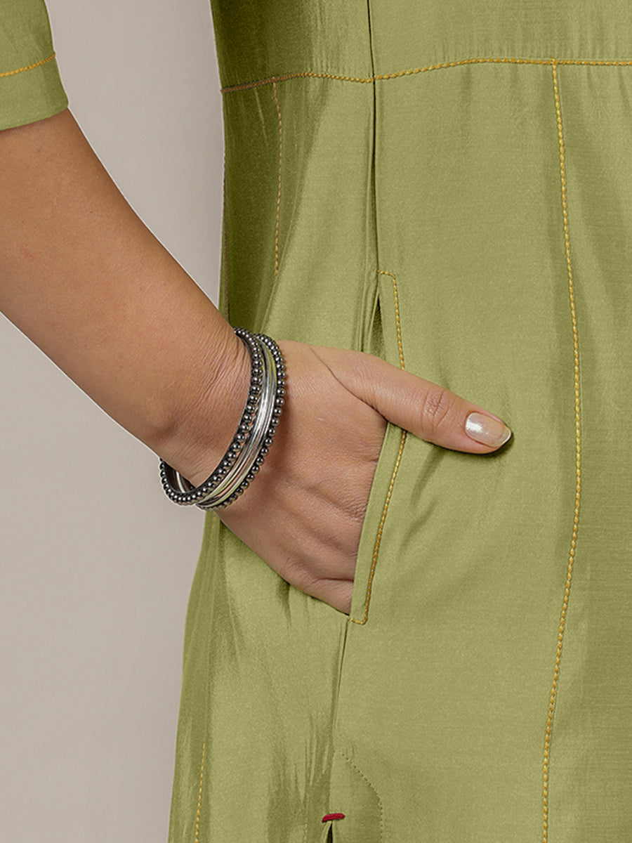 Mahi x Rozaana Kurta, in Green Viscose, featuring three quarter sleeves and round neck with splitline, made for daily & work.