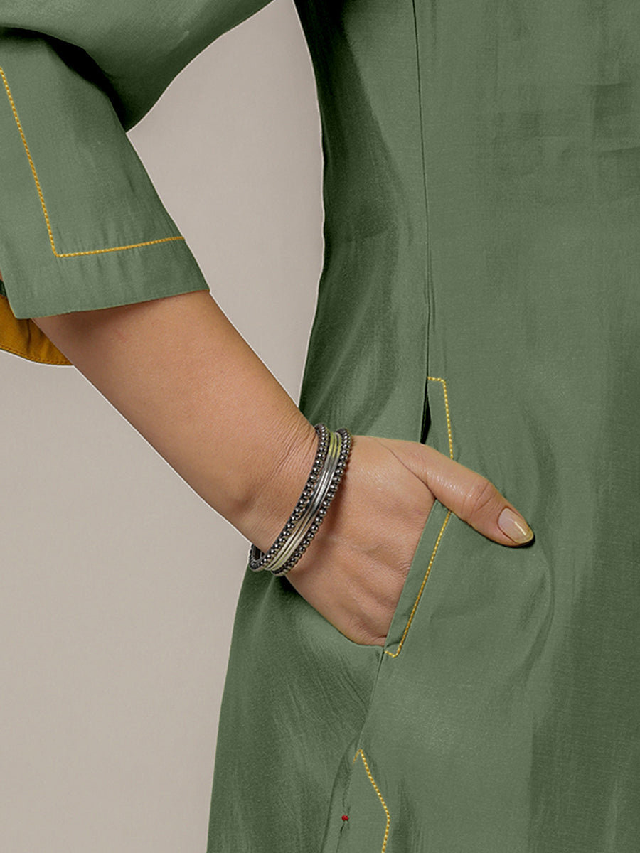 Nimrat x Rozaana Kurta, in Green Viscose, featuring three quarter sleeves and round neck with splitline (view 4).