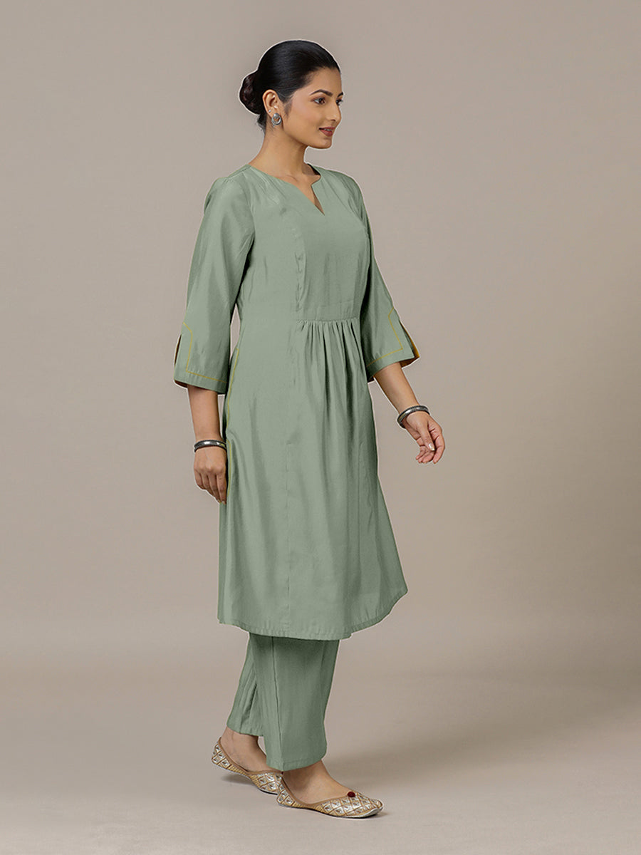 Nimrat x Rozaana Kurta, in Green Viscose, featuring three quarter sleeves and round neck with splitline.