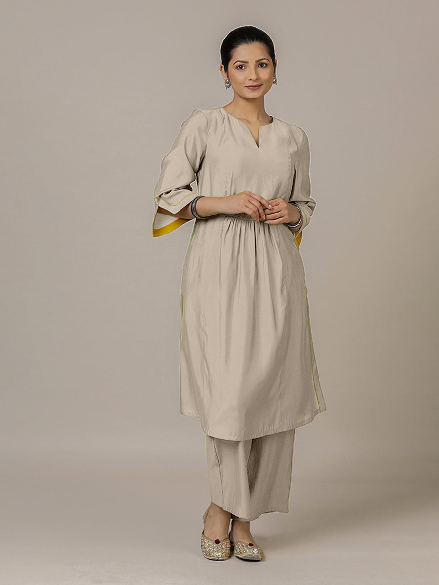 Nimrat x Rozaana Kurta, in Grey Viscose, featuring three quarter sleeves and round neck with splitline.