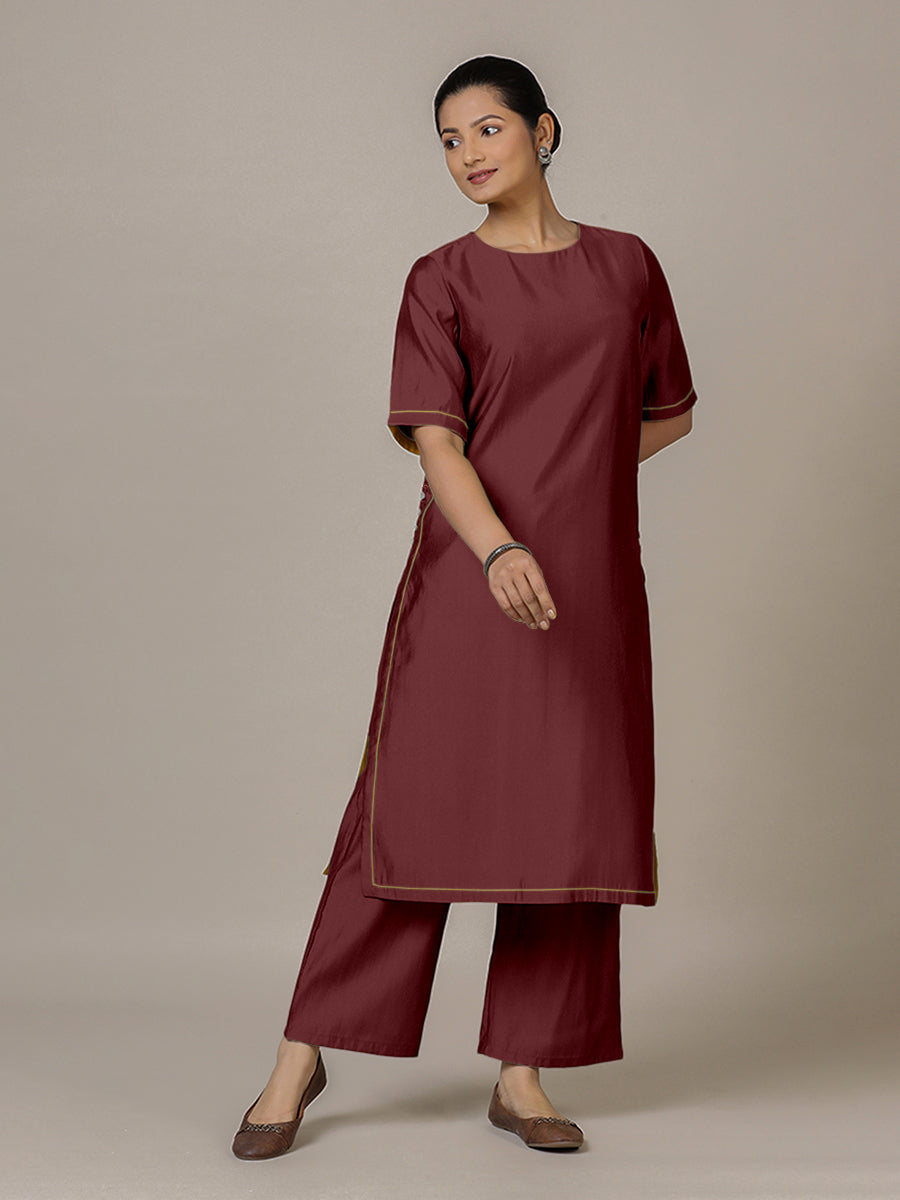 Riya x Rozaana Kurta, in Maroon Viscose, featuring elbow sleeves and jewel neckline, made for daily & work.