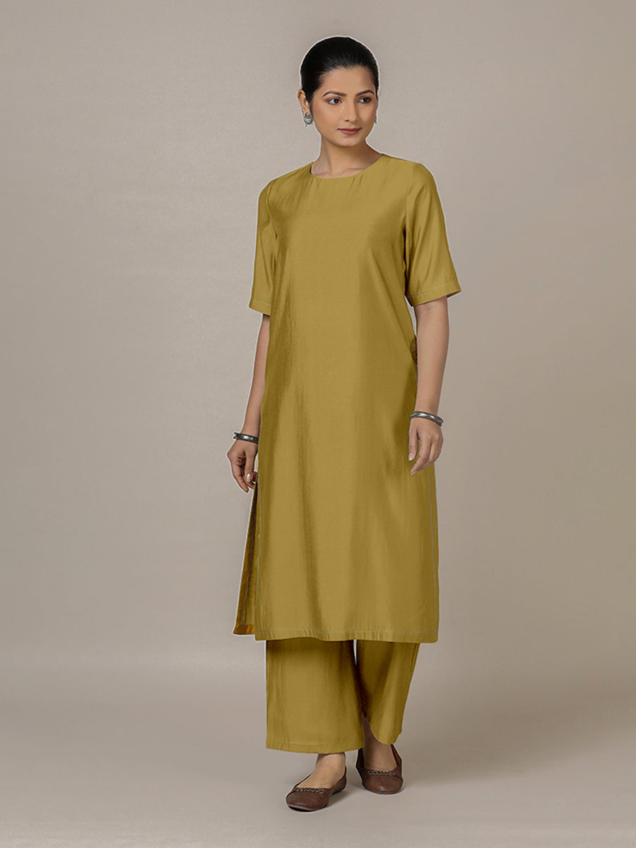 Riya x Rozaana Kurta, in Yellow Viscose, featuring elbow sleeves and jewel neckline, made for daily & work.