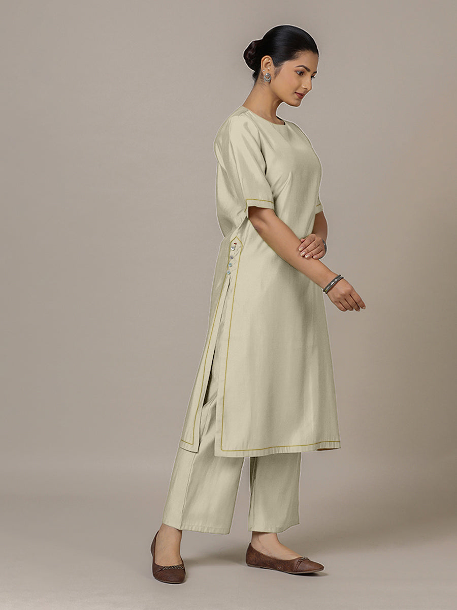 Riya x Rozaana Kurta, in Cream Viscose, featuring elbow sleeves and jewel neckline, made for daily & work.