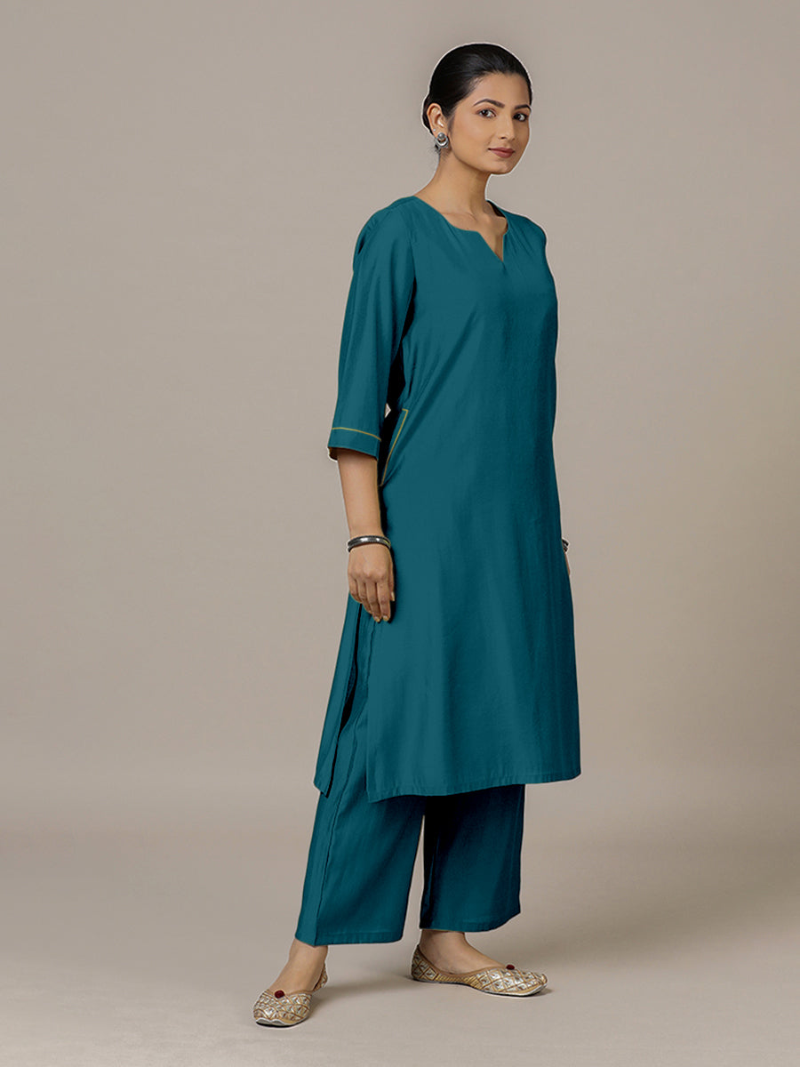 Sadaf x Rozaana Kurta, in Blue Viscose, featuring three quarter sleeves and round neck with splitline, made for daily & work.