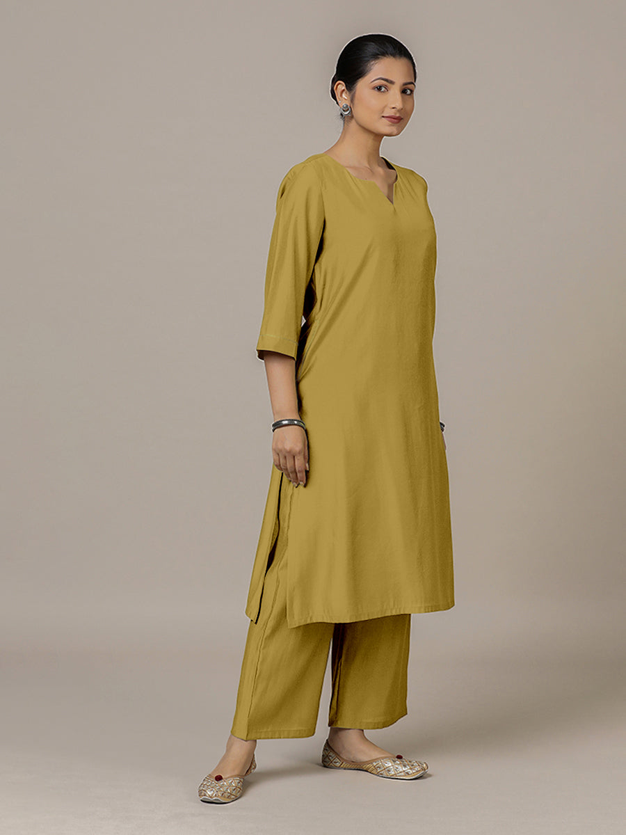 Sadaf x Rozaana Kurta, in Yellow Viscose, featuring three quarter sleeves and round neck with splitline.