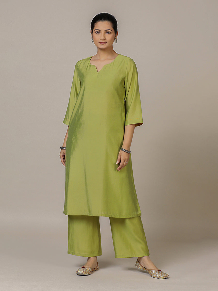 Sadaf x Rozaana Kurta, in Green Viscose, featuring three quarter sleeves and round neck with splitline.
