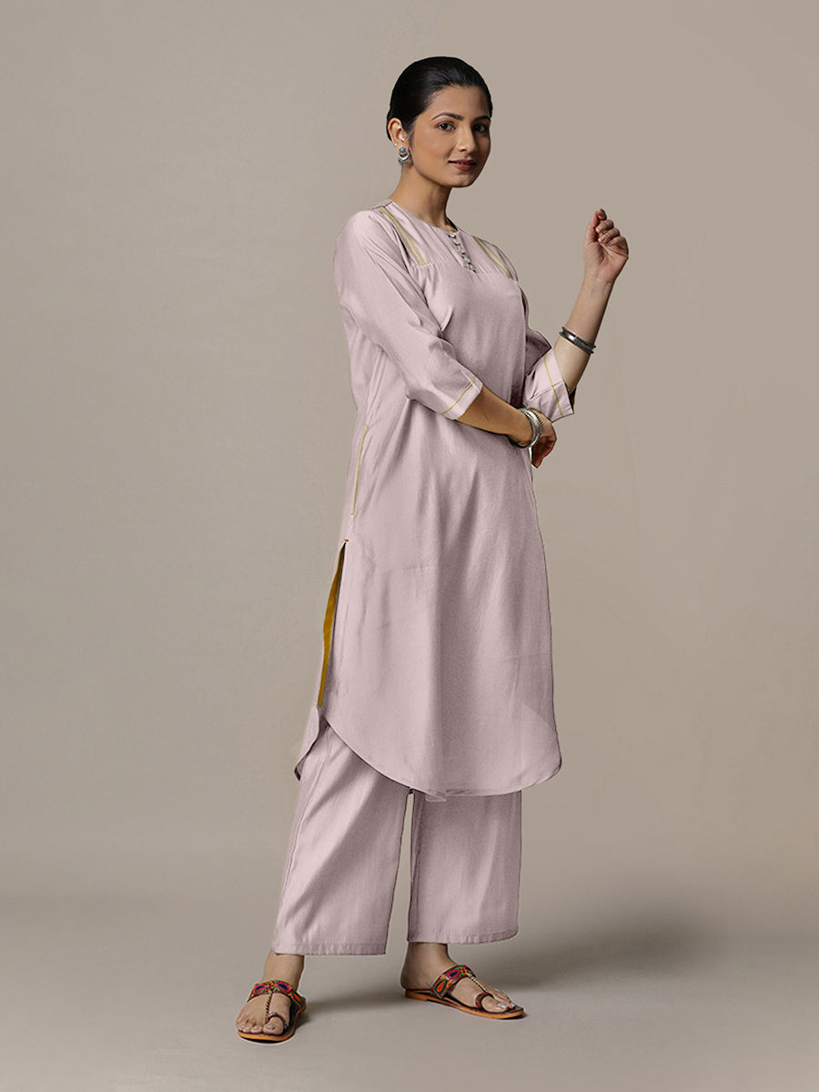 Urvi x Rozaana Kurta, in Purple Viscose, featuring three quarter sleeves and round neckline, made for daily & work.