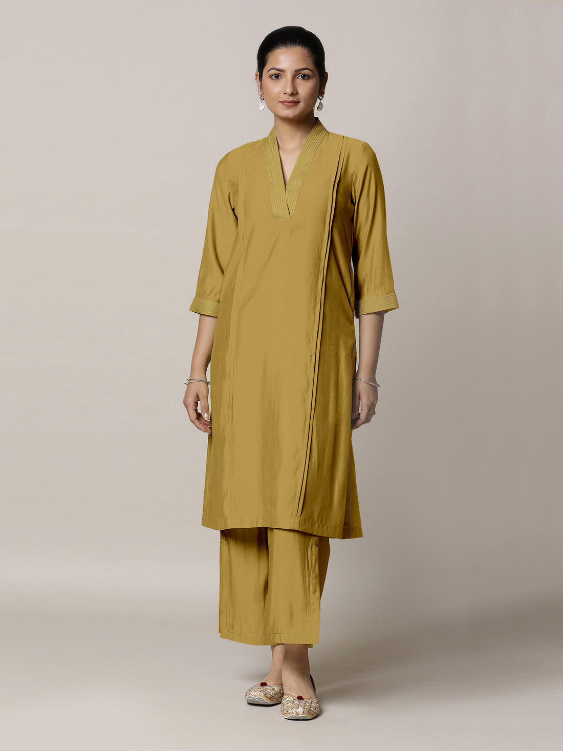 Vanya x Rozaana Kurta, in Yellow Viscose, featuring three quarter sleeves and band collar neckline, made for daily & work.
