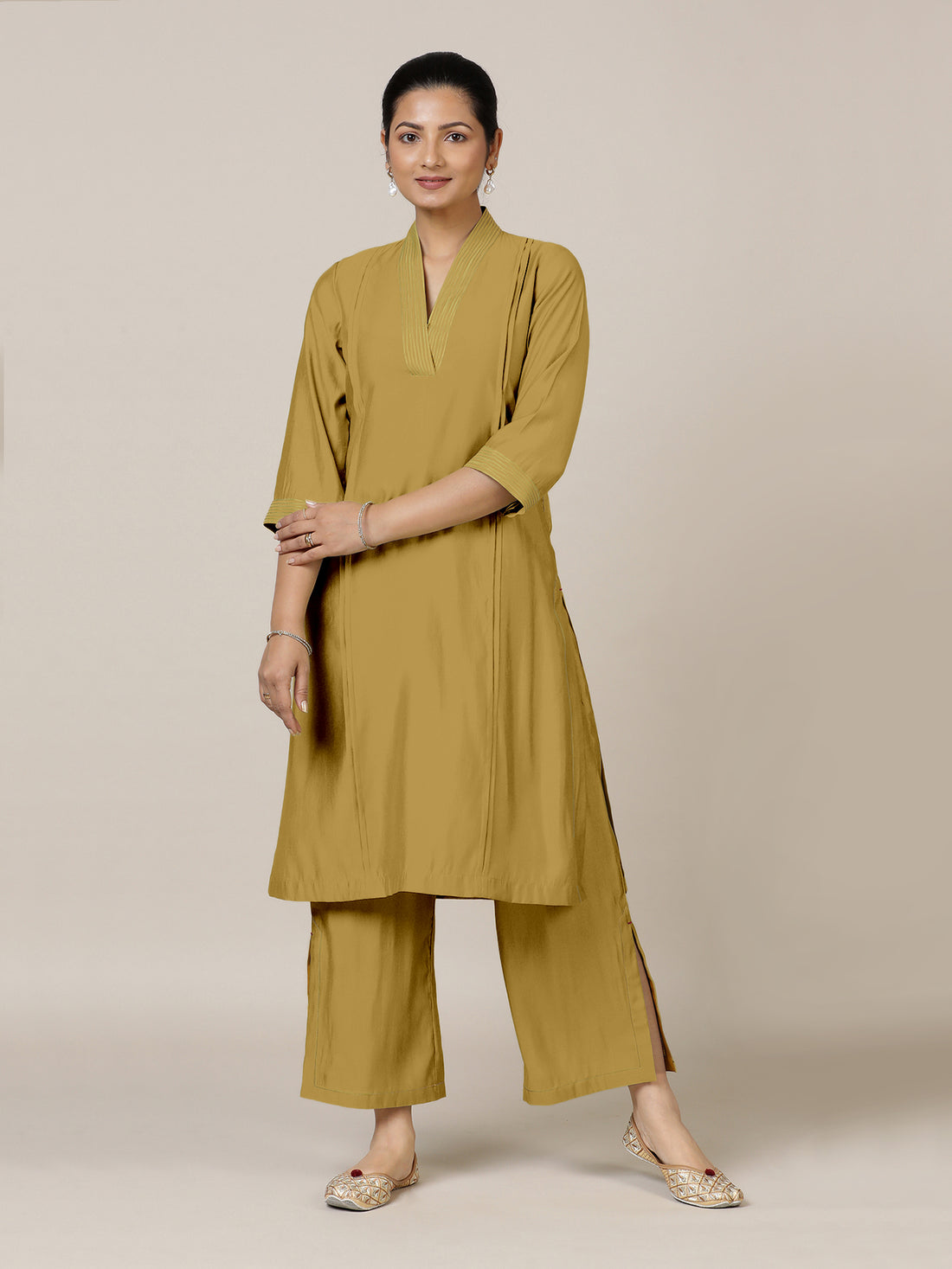 Vanya x Rozaana Kurta, in Yellow Viscose, featuring three quarter sleeves and band collar neckline, made for daily & work.