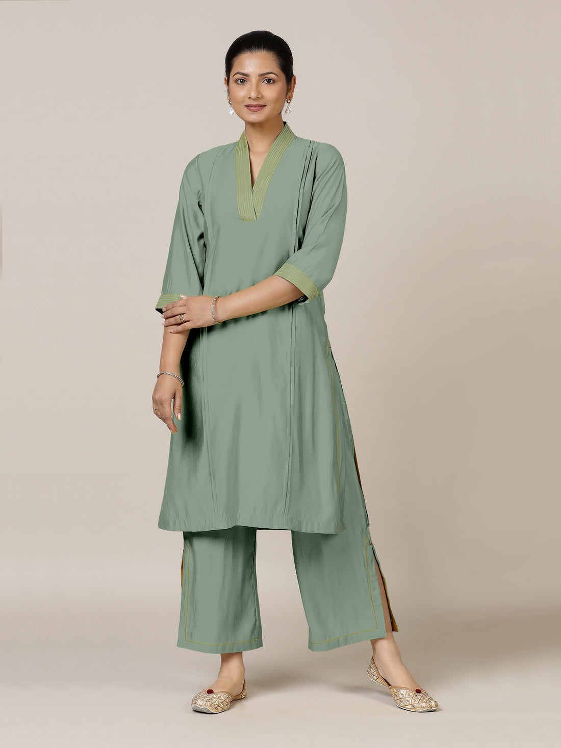 Vanya x Rozaana Kurta, in Green Viscose, featuring three quarter sleeves and band collar neckline, made for daily & work.