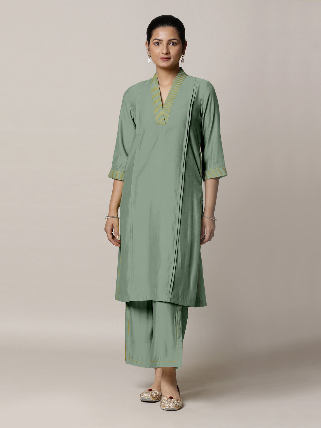 Vanya x Rozaana Kurta, in Green Viscose, featuring three quarter sleeves and band collar neckline, made for daily & work.