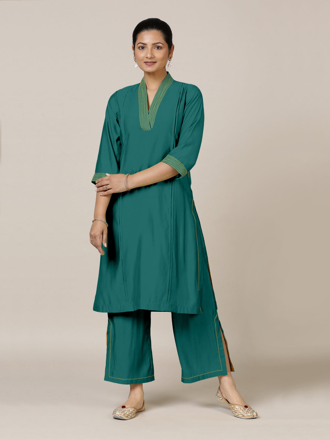Vanya x Rozaana Kurta, in Green Viscose, featuring three quarter sleeves and band collar neckline, made for daily & work.