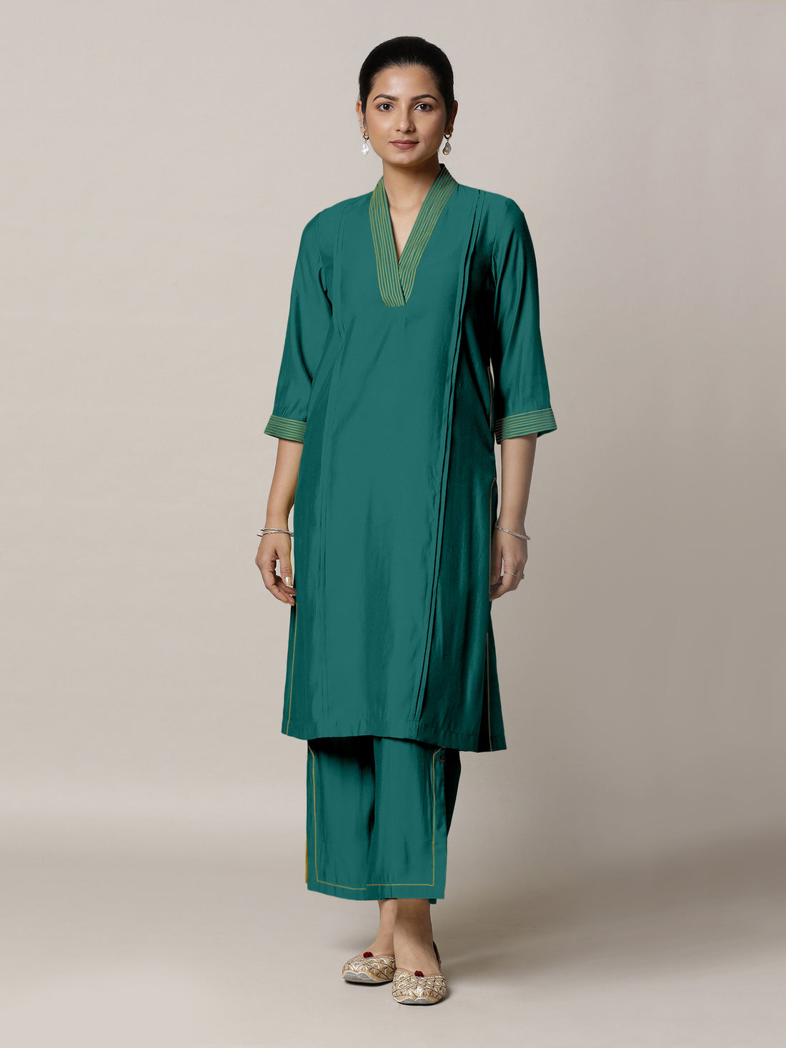 Vanya x Rozaana Kurta, in Green Viscose, featuring three quarter sleeves and band collar neckline, made for daily & work.