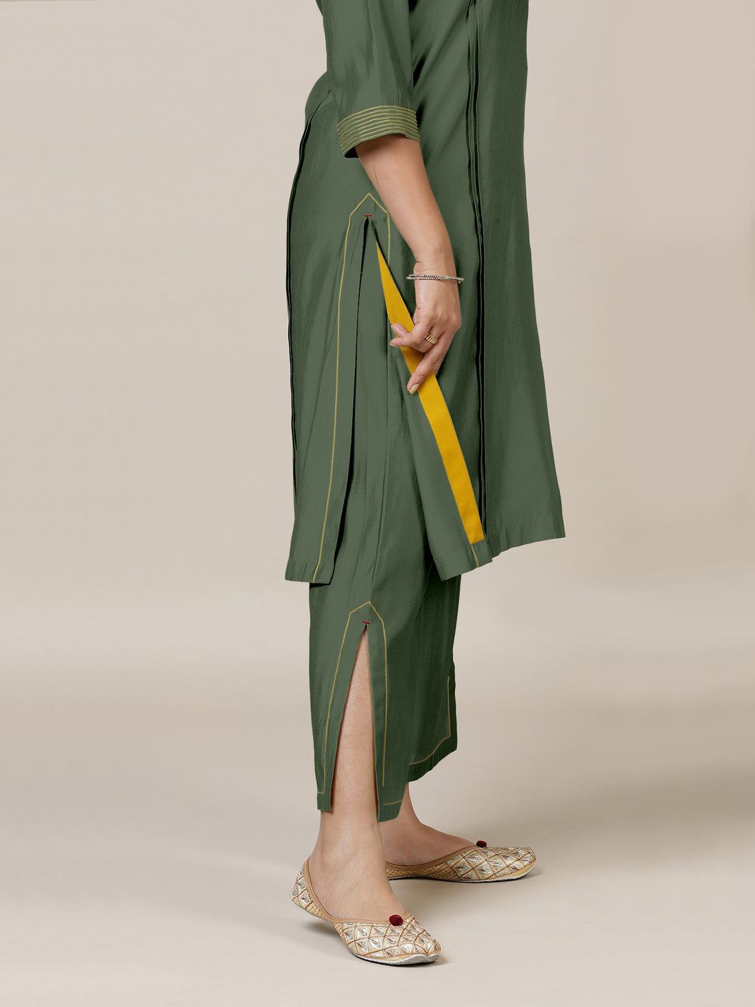 Vanya x Rozaana Kurta, in Green Viscose, featuring three quarter sleeves and band collar neckline, made for daily & work.