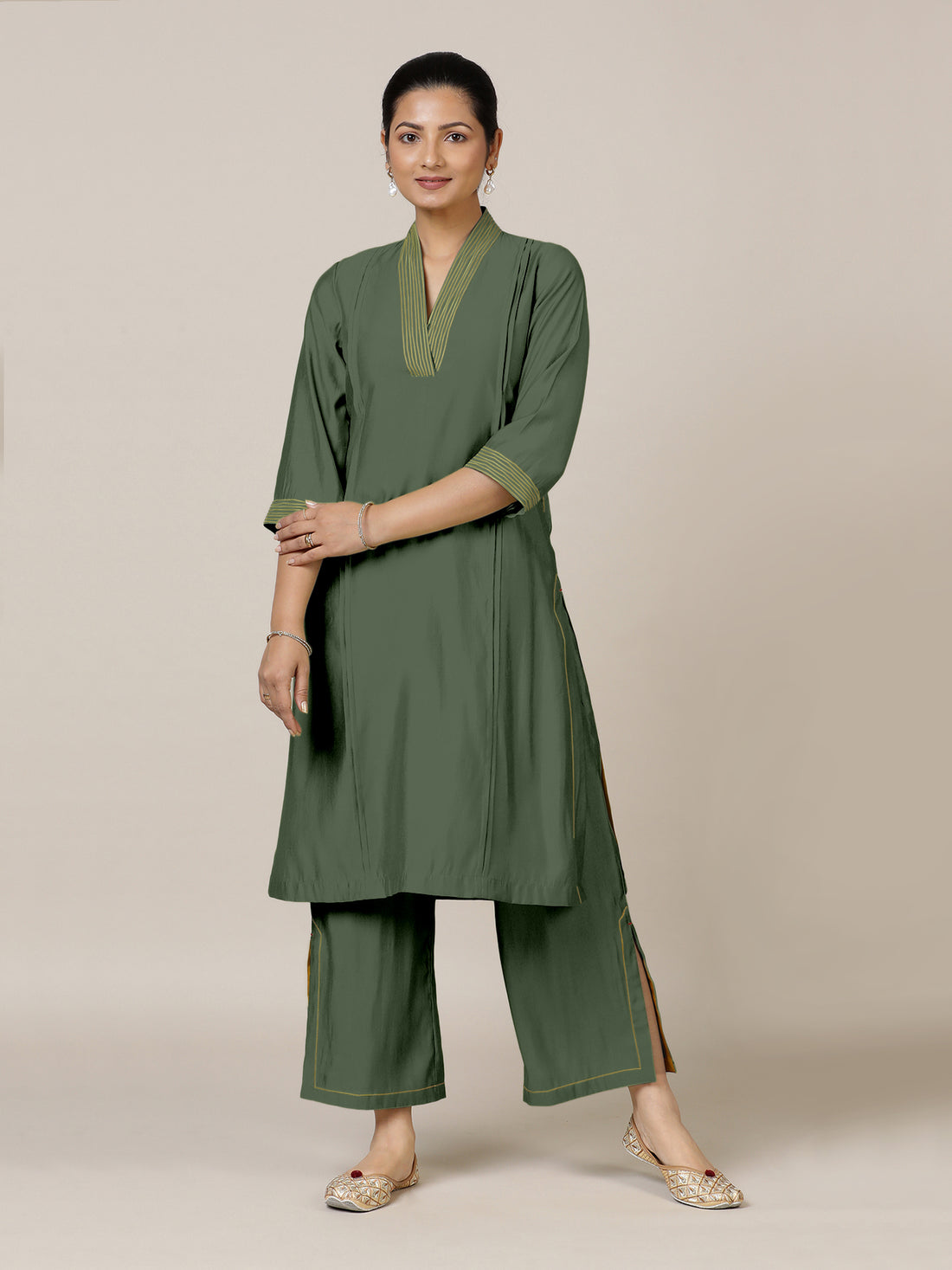 Vanya x Rozaana Kurta, in Green Viscose, featuring three quarter sleeves and band collar neckline, made for daily & work.