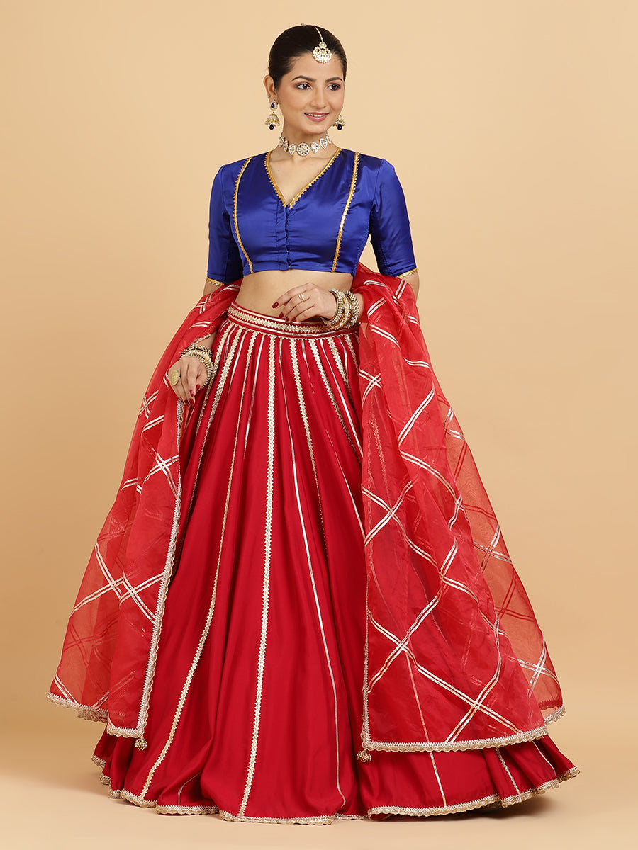 Madhuri Begum 4-Pc Lehenga Set x Tyohaar, in Red, featuring elbow sleeves and v-neckline, made for party & festive (view 2).