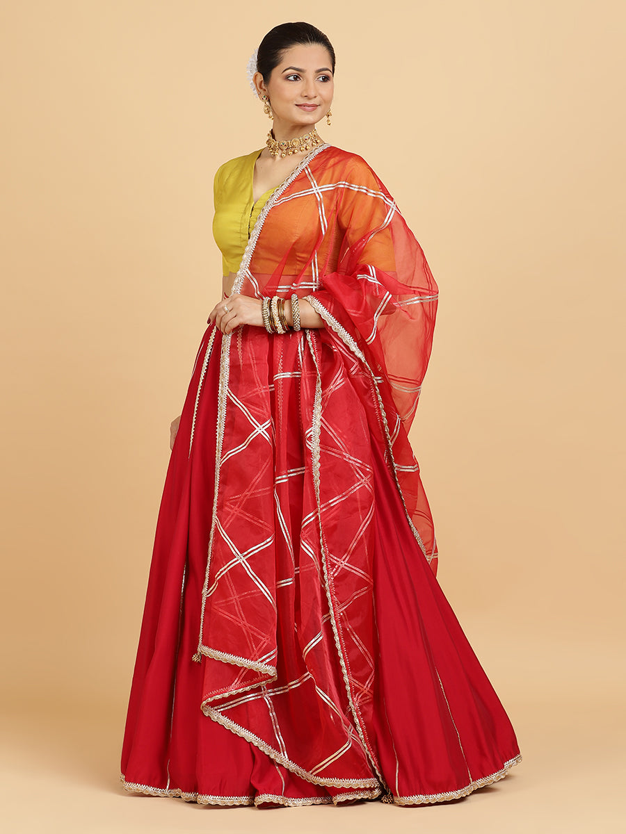 Madhuri Begum 4-Pc Lehenga Set x Tyohaar, in Red, featuring elbow sleeves and v-neckline, made for party & festive (view 3).