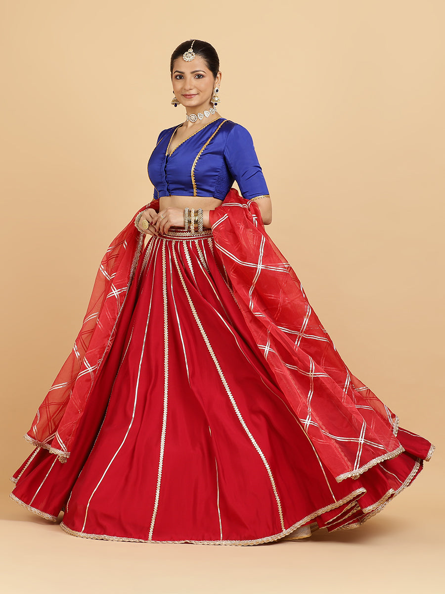 Madhuri Begum 4-Pc Lehenga Set x Tyohaar, in Red, featuring elbow sleeves and v-neckline, made for party & festive (view 6).