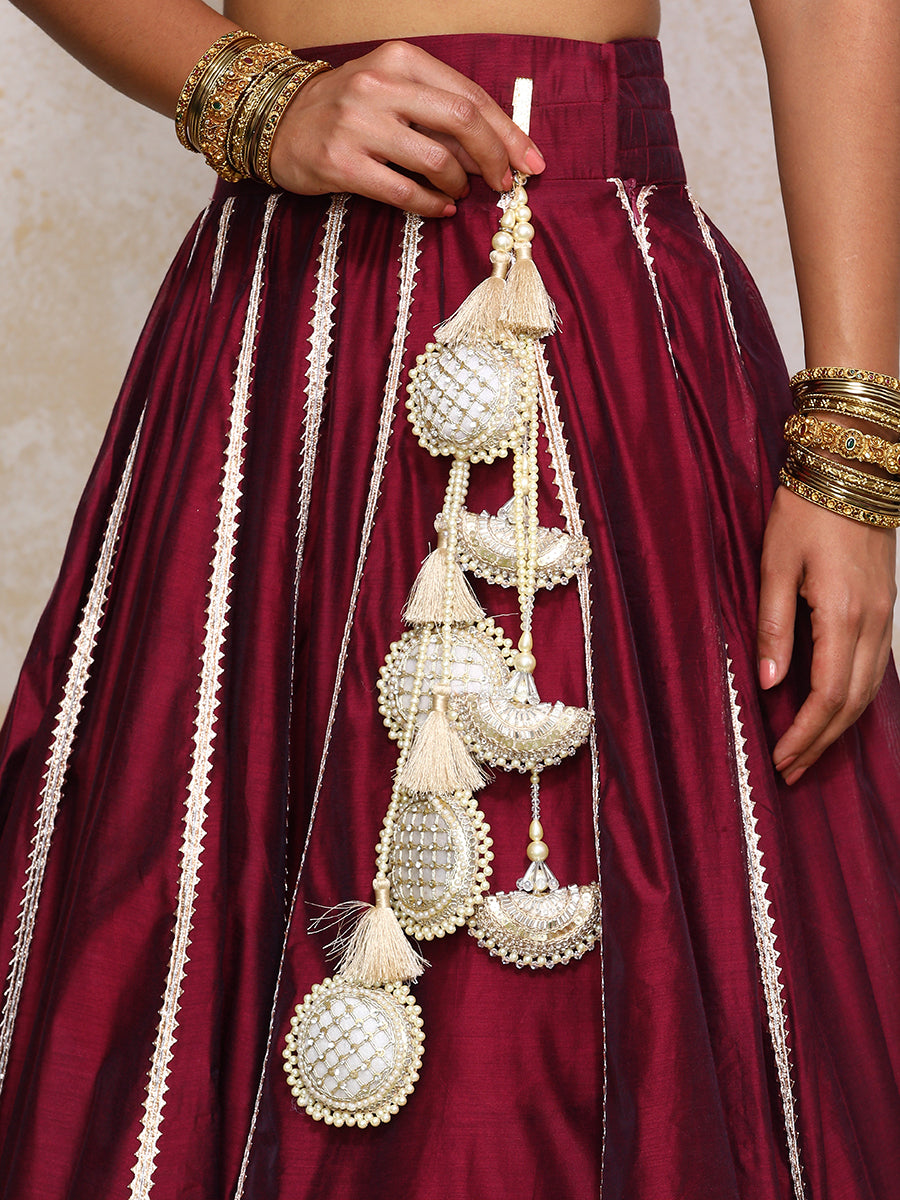 Mahira x Tyohaar Lehenga Set, in Maroon Chandheri, featuring elbow sleeves and scoop neckline, made for party & festive.