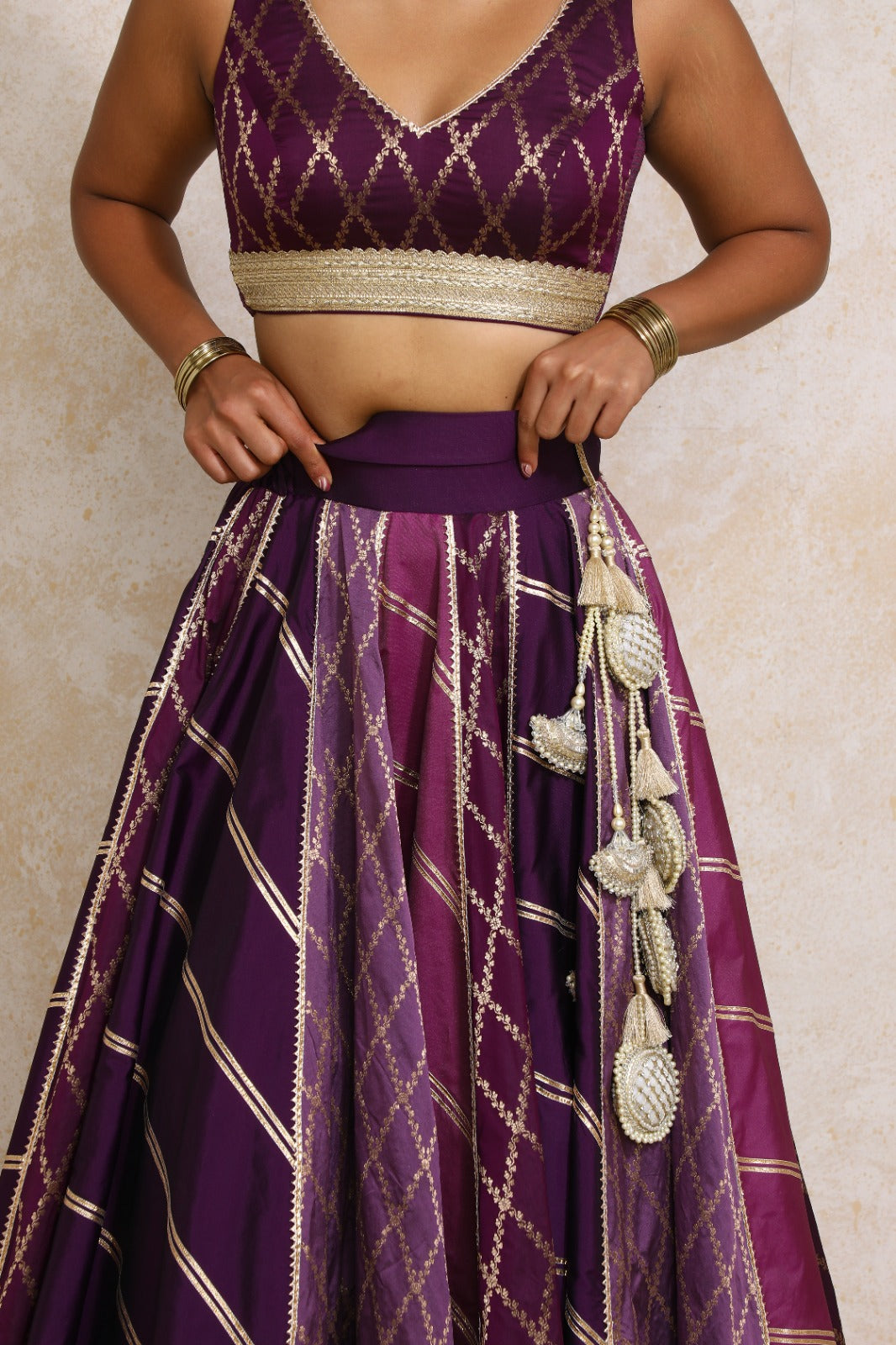 Raahi x Tyohaar Lehenga Set, in Purple Viscose Silk Brocade, featuring sleeveless and curved v-neckline (view 4).