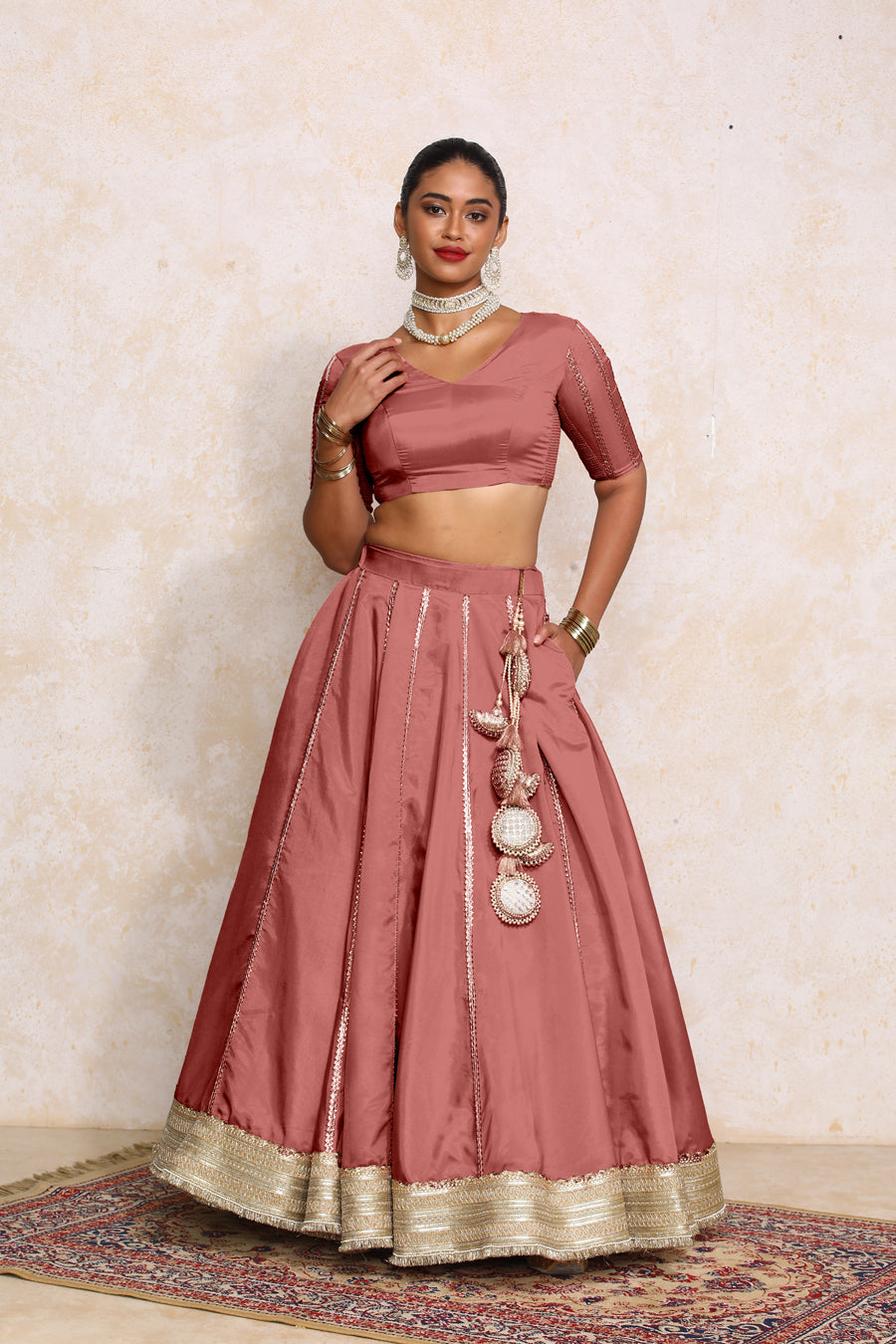 Ruhani x Tyohaar Lehenga Set, in Pink Viscose Gold Tissue, featuring elbow sleeves and v-neckline, made for party & festive.