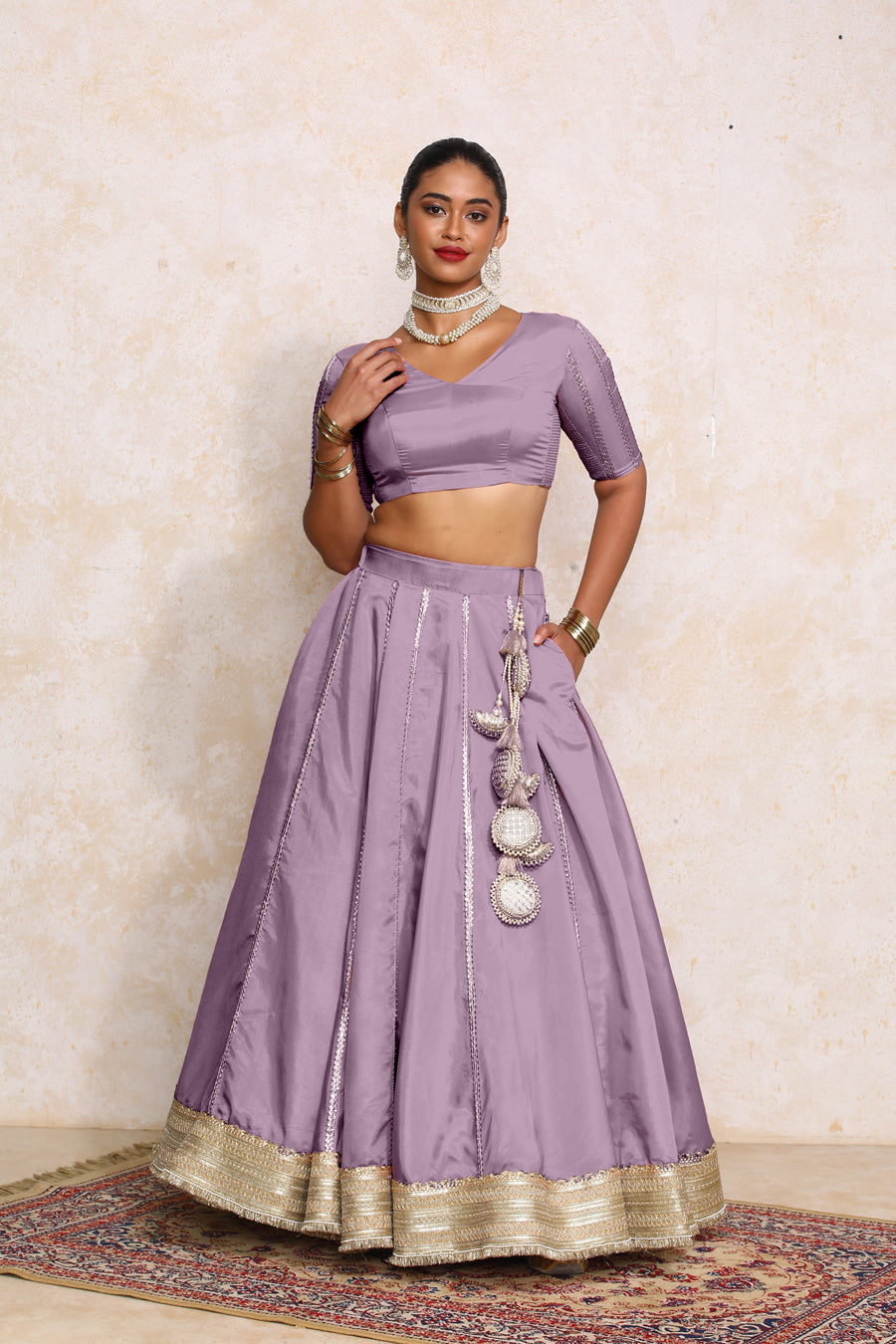 Ruhani x Tyohaar Lehenga Set, in Purple Viscose Gold Tissue, featuring elbow sleeves and v-neckline (view 6).