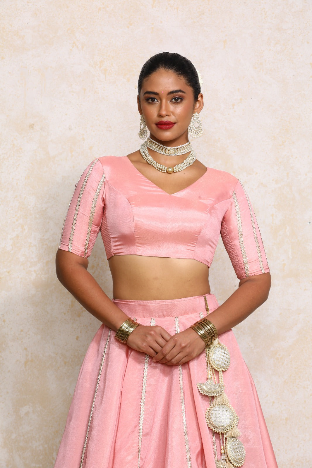 Aashni x Tyohaar Saree Blouse, in Pink Viscose Gold Tissue, featuring elbow sleeves and v-neckline, made for party & festive.