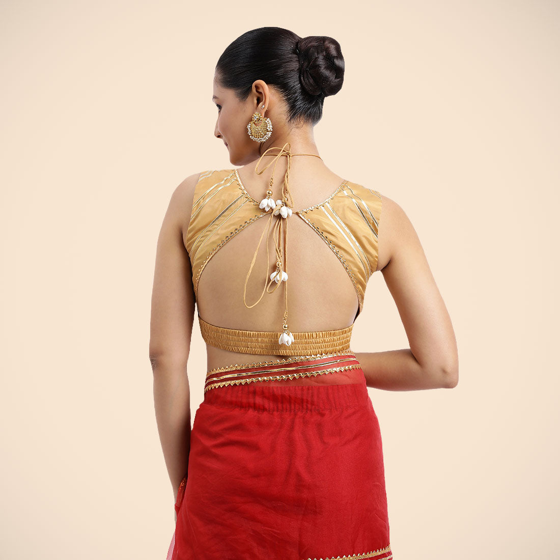 Ahana x Tyohaar Saree Blouse, in Gold Vegan Silk, featuring sleeveless and tie-up neckline, made for party & festive (view 2).