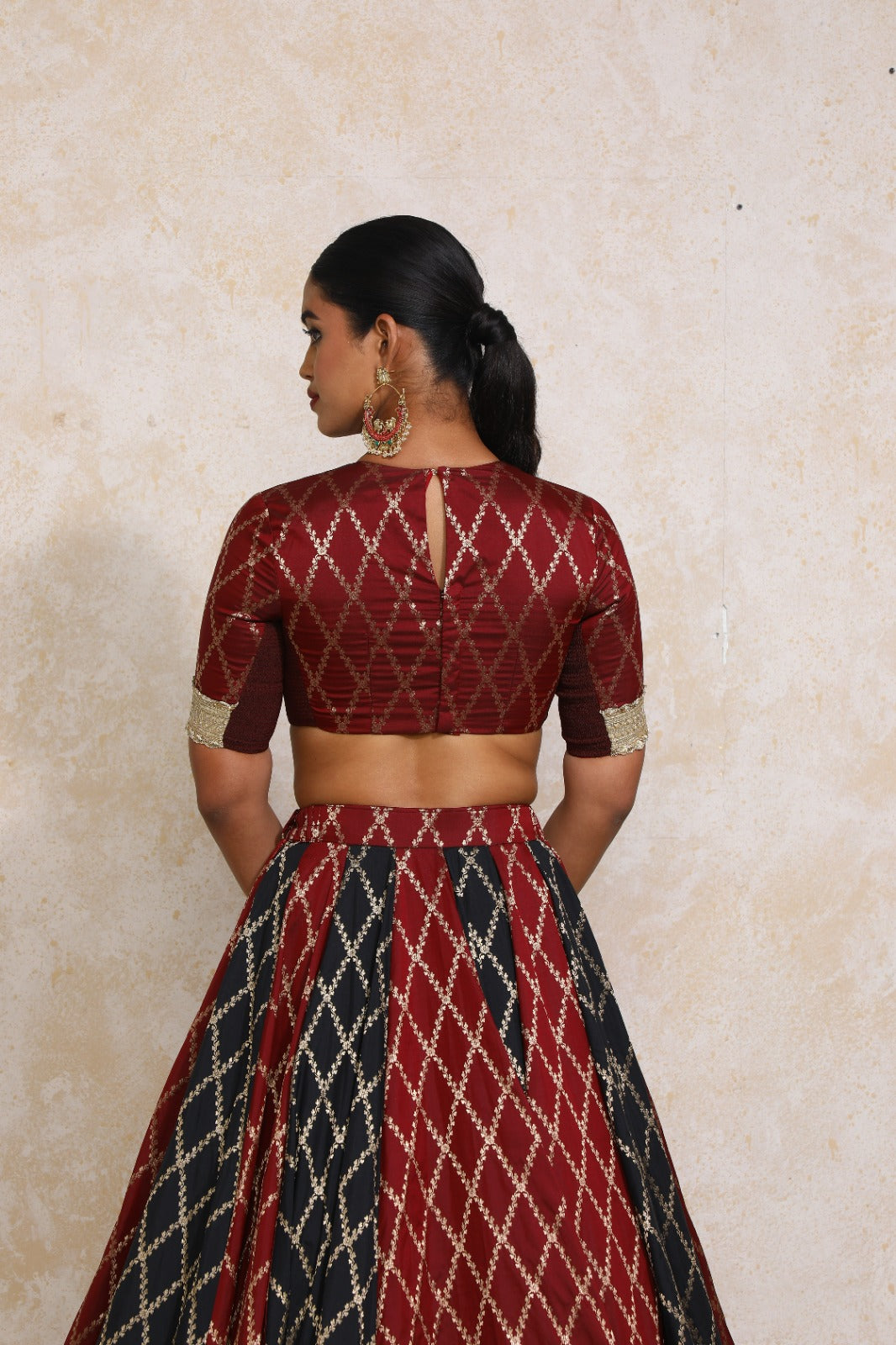 Amaavi x Tyohaar Saree Blouse, in Maroon Viscose Silk Brocade, featuring elbow sleeves and jewel neckline (view 2).