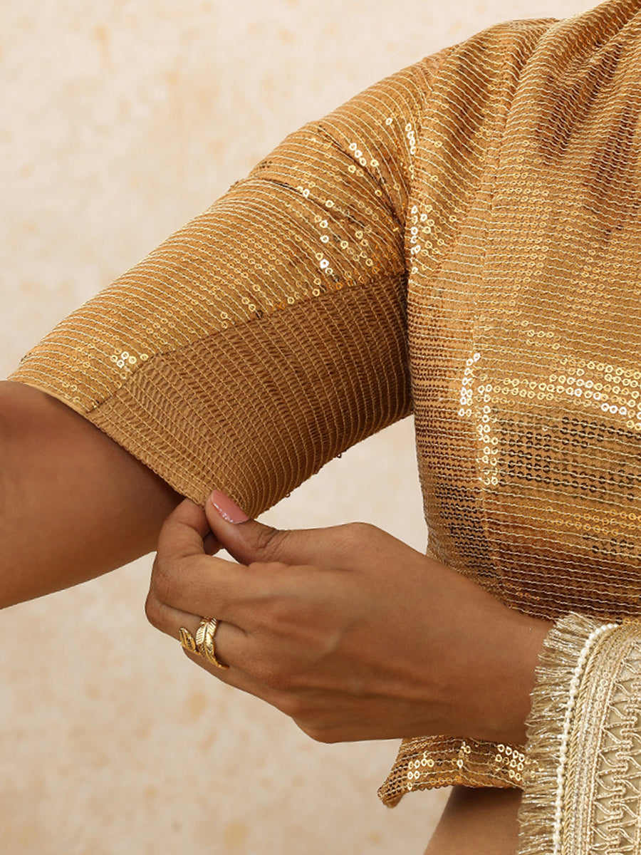 Amina x Tyohaar Saree Blouse, in Gold Sequin Fabric, featuring elbow sleeves and v-neckline, made for party & festive (view 4).