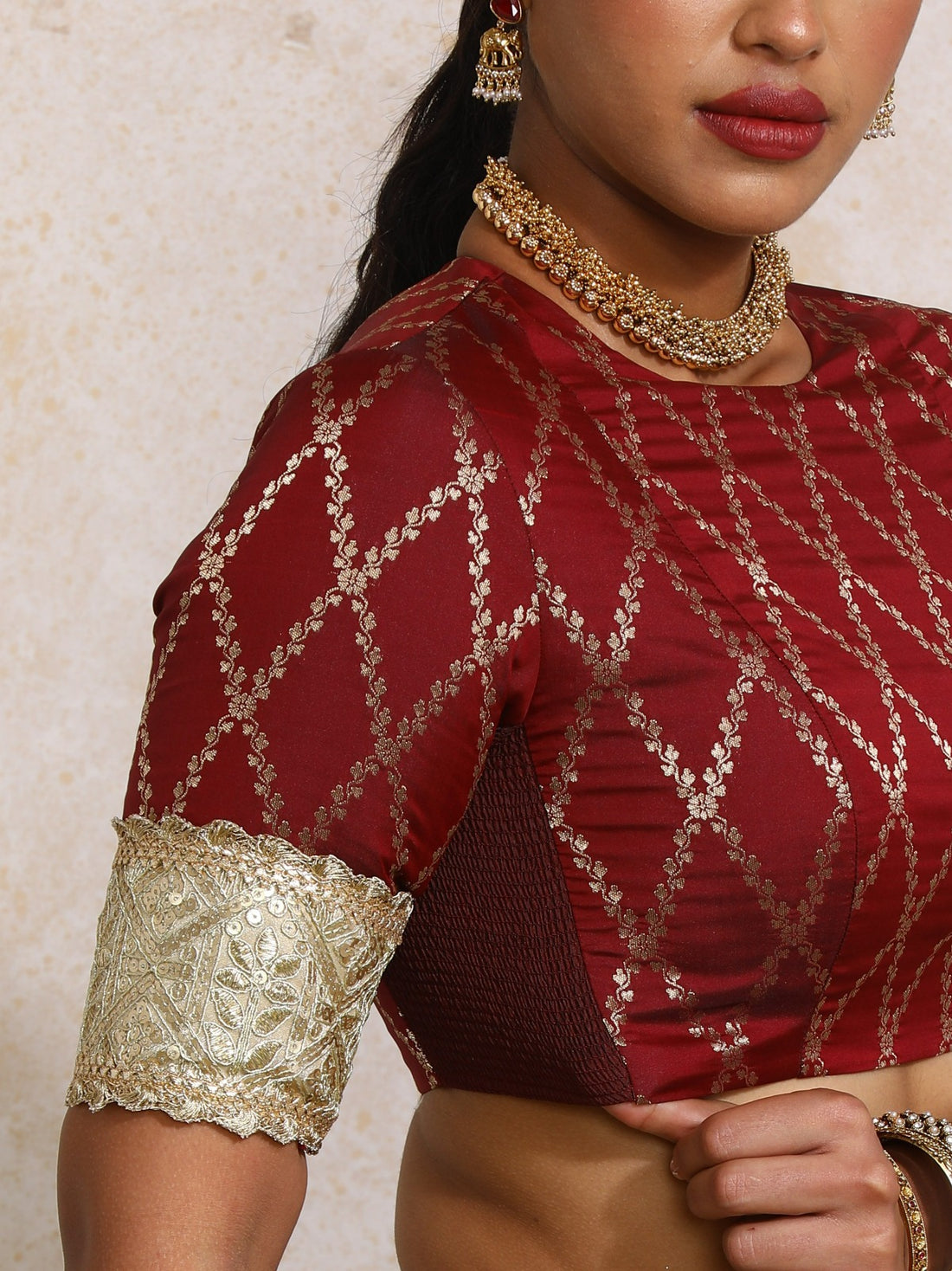 Amrita x Tyohaar Saree Blouse, in Maroon Viscose Silk Brocade, featuring elbow sleeves and jewel neckline (view 3).