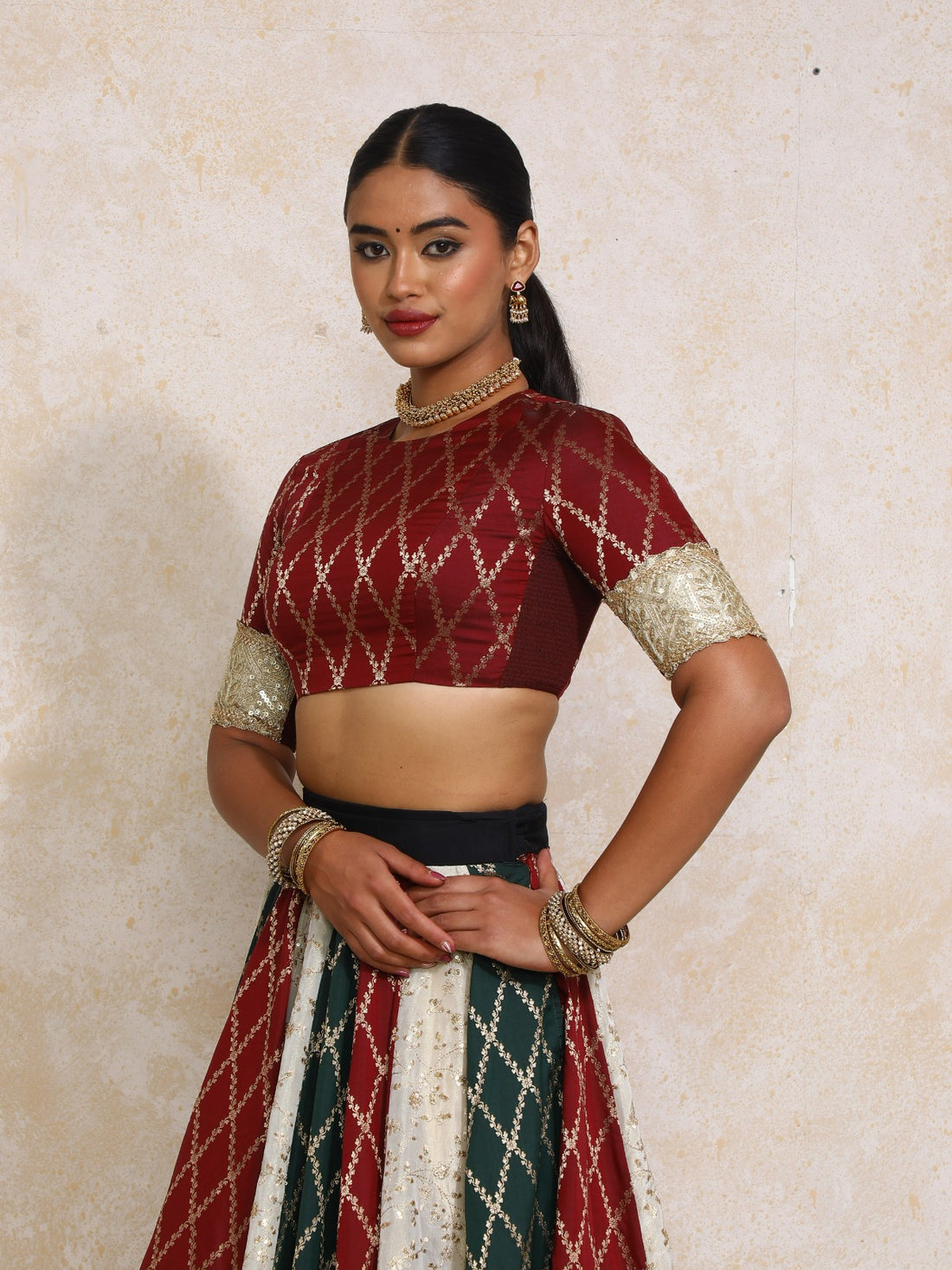 Amrita x Tyohaar Saree Blouse, in Maroon Viscose Silk Brocade, featuring elbow sleeves and jewel neckline (view 5).