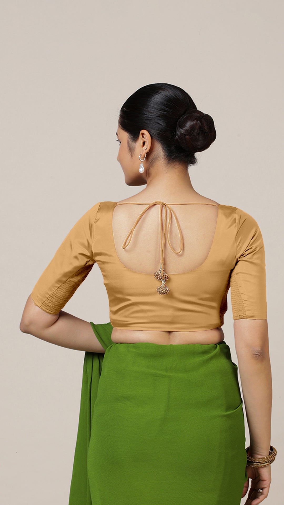Anisha x Rozaana Saree Blouse, in Gold Vegan Silk, featuring elbow sleeves and round neckline, made for daily & work (view 2).