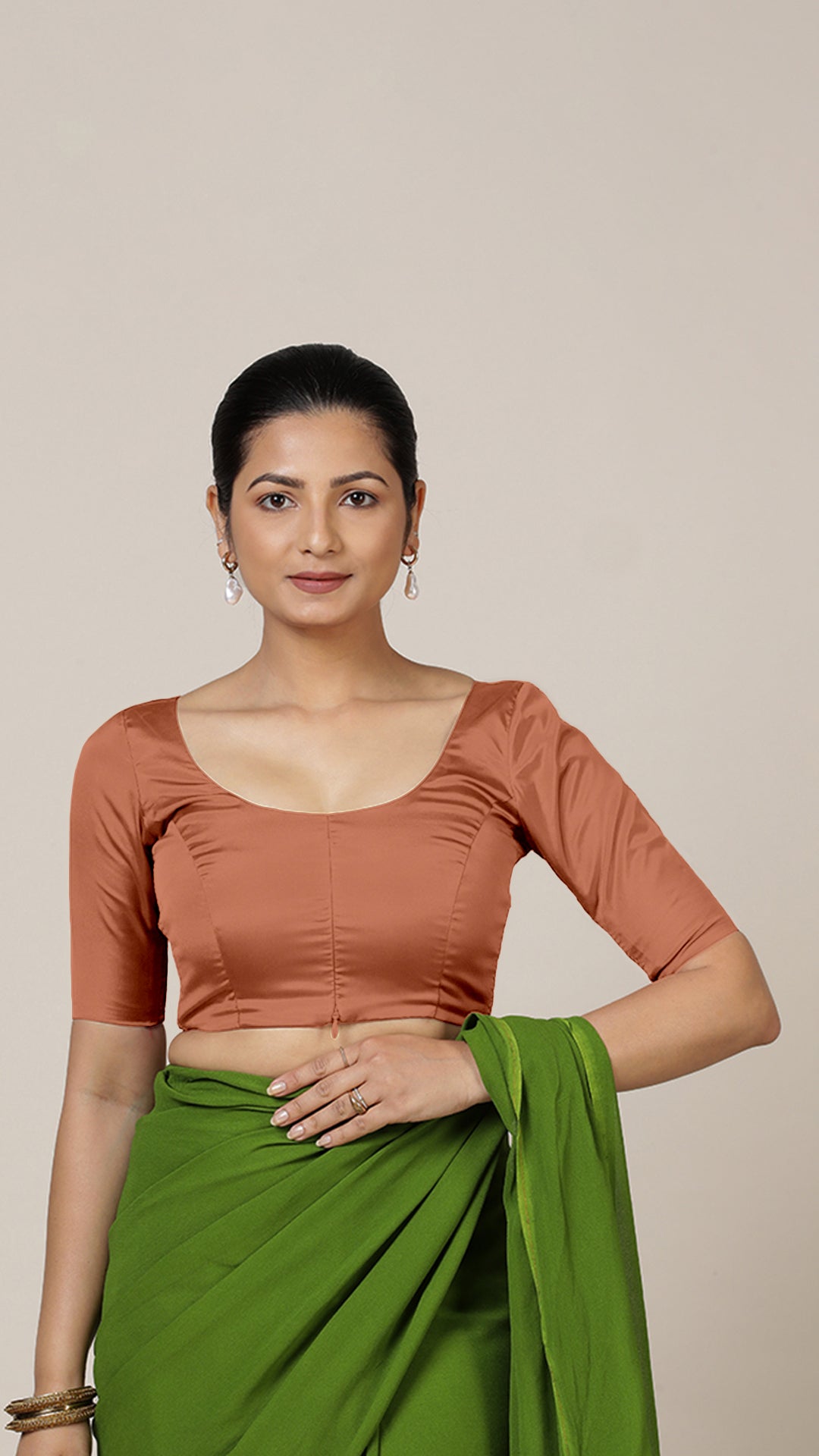 Anisha x Rozaana Saree Blouse, in Copper Vegan Silk, featuring elbow sleeves and round neckline, made for daily & work (view 6).
