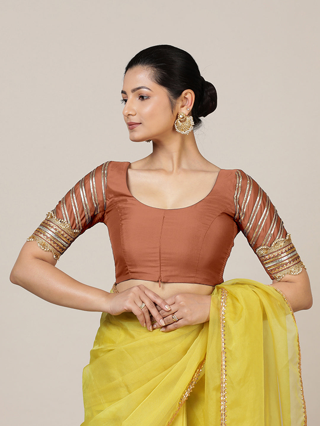 Anisha x Tyohaar Saree Blouse, in Copper Vegan Silk, featuring elbow sleeves and round neckline, made for party & festive.
