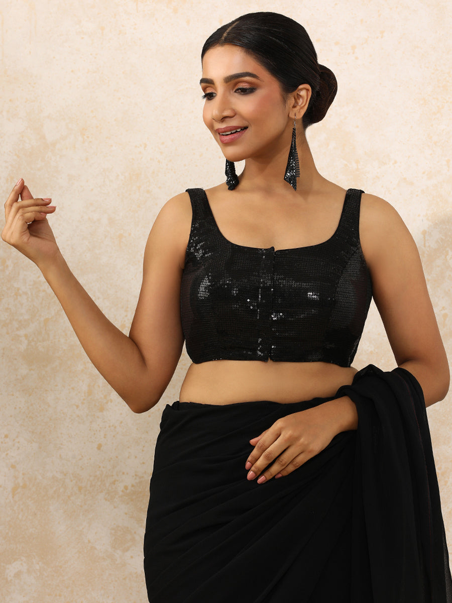Ayesha x Tyohaar Saree Blouse, in Black Sequin Fabric, featuring sleeveless and round neckline, made for party & festive.