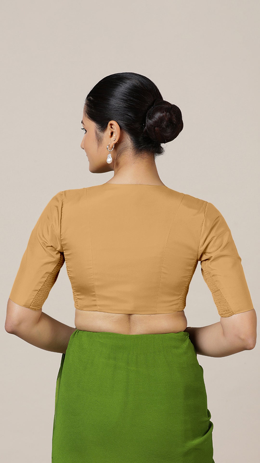 Begum x Rozaana Saree Blouse, in Gold Vegan Silk, featuring elbow sleeves and v-neckline, made for daily & work (view 3).