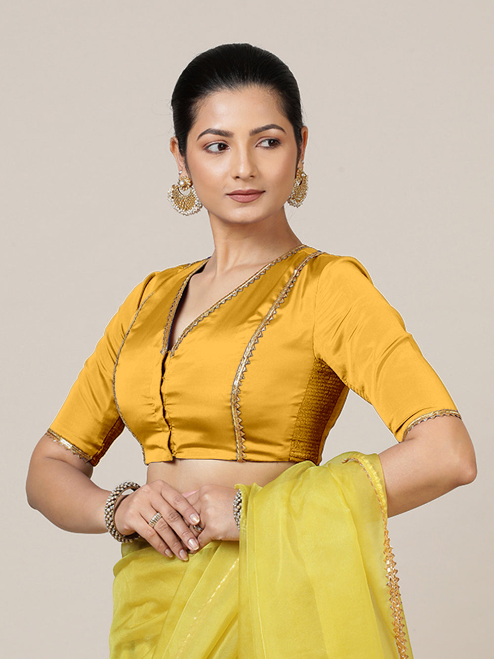 Begum x Tyohaar | Elbow Sleeves Marigold Yellow FlexiFit™ Gota Embellished Saree Blouse with V-Neck