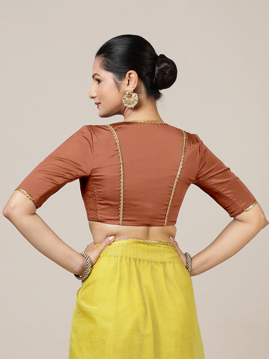 Begum x Tyohaar Saree Blouse, in Copper Vegan Silk, featuring elbow sleeves and v-neckline, made for party & festive (view 2).